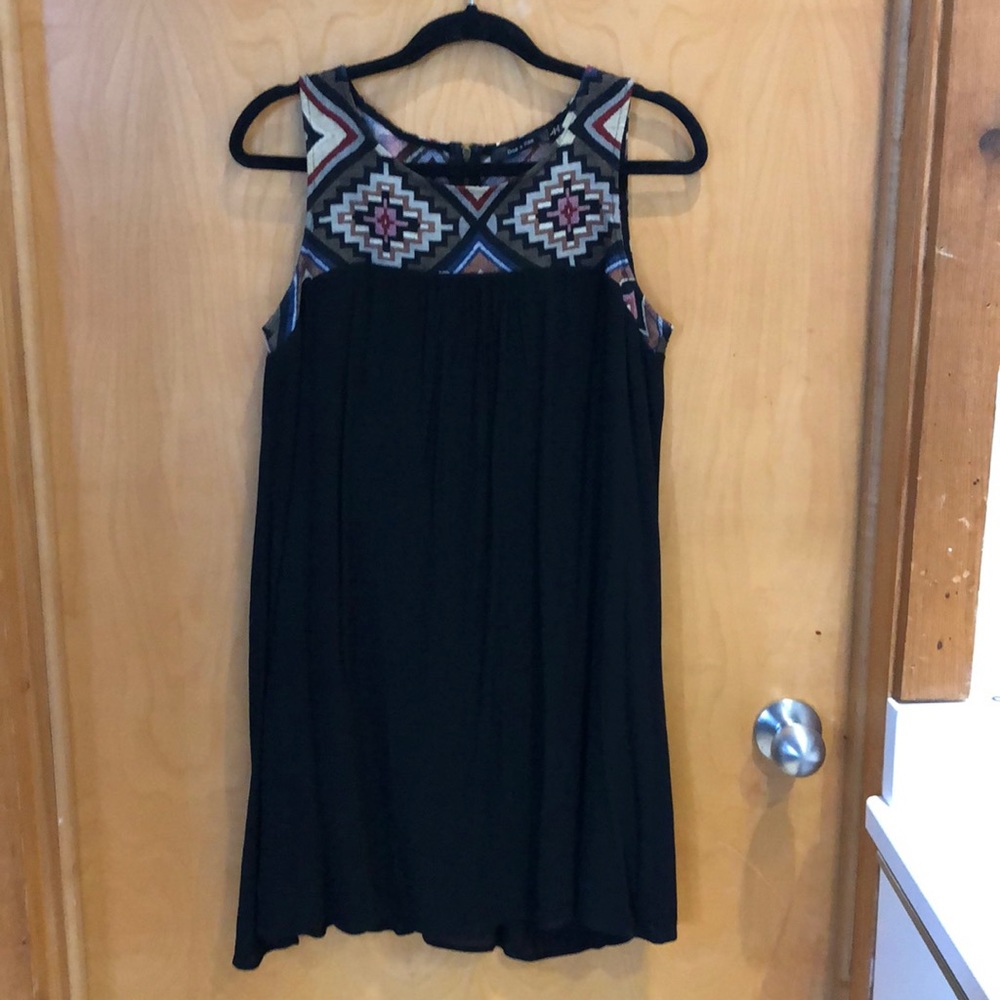 Black dress with pattern detail